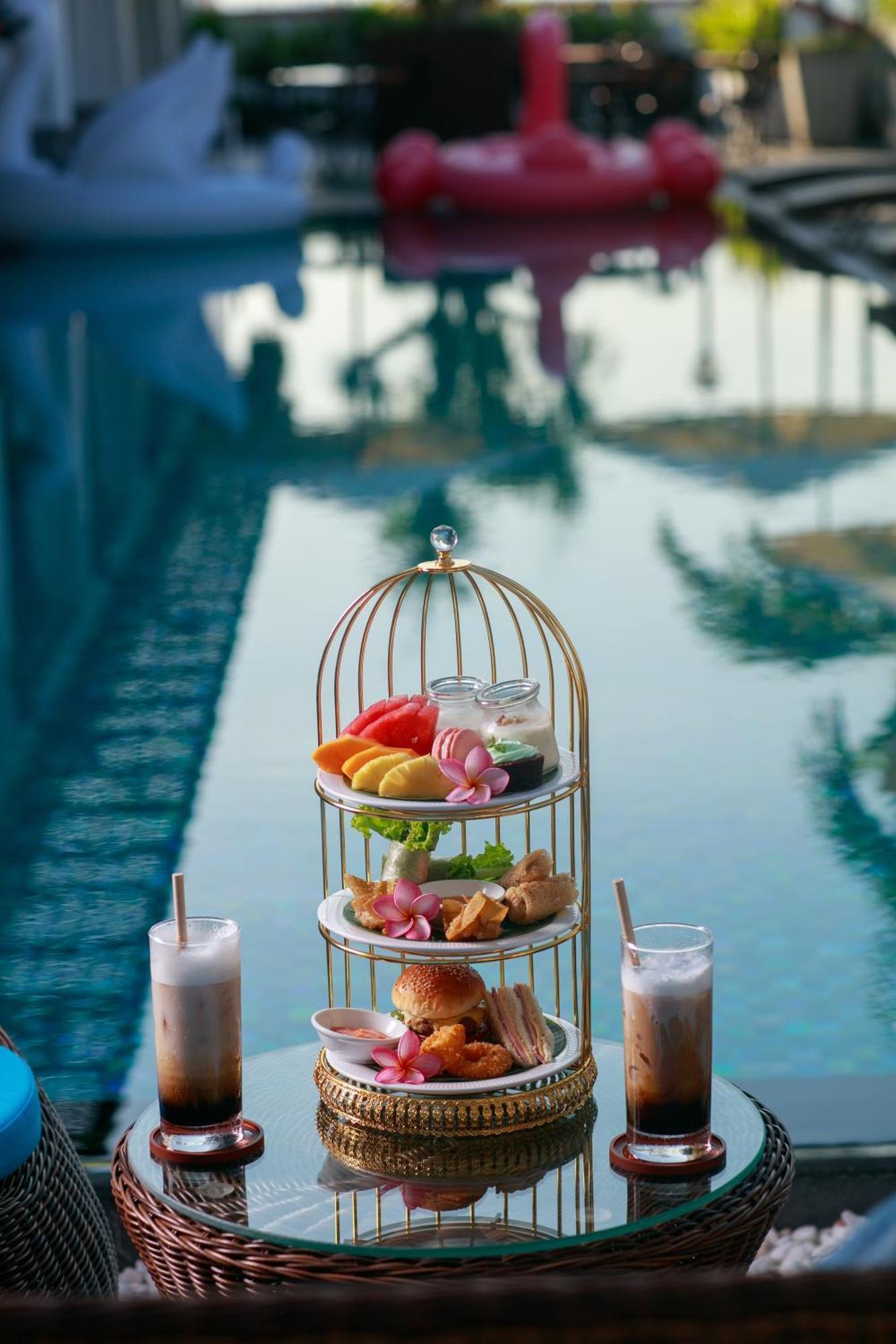 Grand Sunrise Palace Hoi An- A Luxury Indochine Hotel & Spa المظهر الخارجي الصورة Afternoon tea at the Royal Mirage